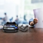 Dot Matrix Printer Used by a Man in Large Organization